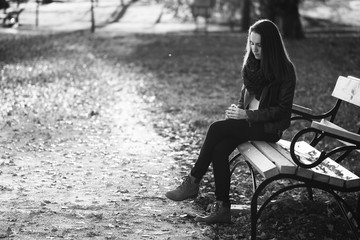 Sad lonely woman on bench