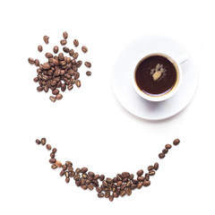 Coffee grains and coffee cup