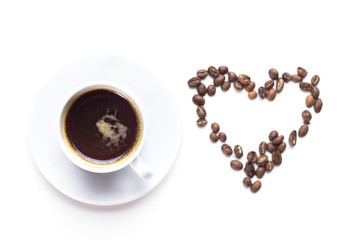 Coffee grains and coffee cup