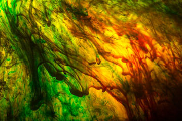 Acrylic colors and ink in water. Abstract background.