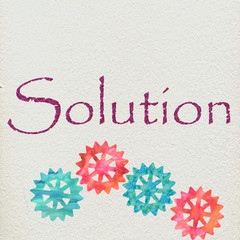 The word solution with gearwheels