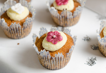 Sponge and cream cup cakes with a shallow depth of field