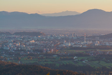 Ljubljana, capital of Slovenia, aerial city view from highland Rasica village which is in the north of the city, at dusk.