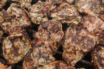 grilled bbq chicken wings on brazier 