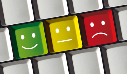 Umfrage Smily Feedback Zufriedenheit Icons auf Computertastatur 