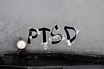 PTSD words  on frost background 