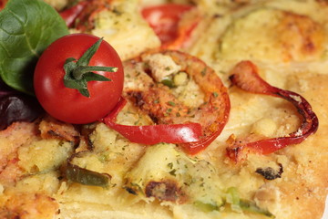 Elche coca vegetables on slate background
