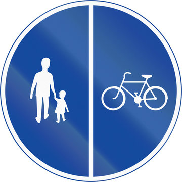 Road sign used in Sweden - Compulsory track for pedestrians, cyclists and moped drivers. Dual track