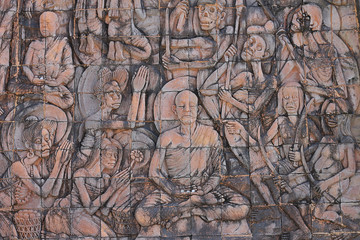 The buddha story sculpture on the wall crafting from the stone