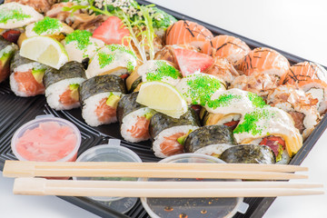 close-up of sushi roll in the black box, Sushi delivery. shallow