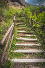 Old wooden stairs leading to mountain in Turkey 