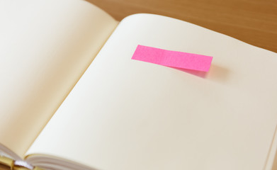 Empty paper with post it paper on page
