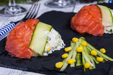 appetizer with rice, corn and salmon