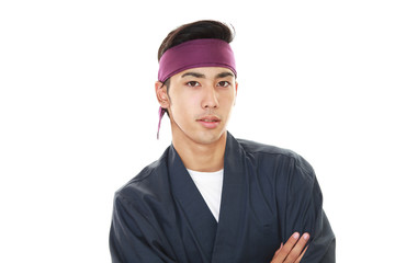 微笑む寿司職人