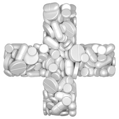 Medicine concept. Cross shape with with pills and capsules.