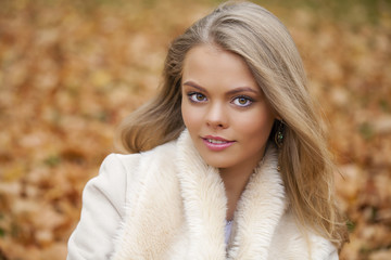 Naklejka premium Portrait close up of young beautiful blonde girl