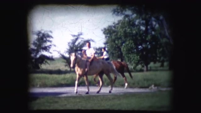 Vintage 8mm footage of people riding a horse near their house on their property