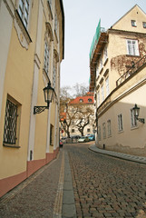 Fototapeta na wymiar PRAGUE, CZECH REPUBLIC - APRIL 16, 2010: Buildings on Snemovni street in Mala Strana (Lesser town)