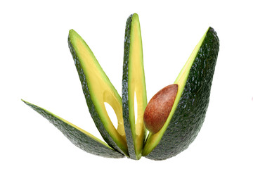 sliced avocado isolated on white background