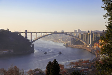 Arrabida bridge and river traffic, Douro river