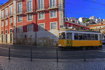 Vintage Lisbon tram on city street