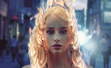 Young woman with burning hair