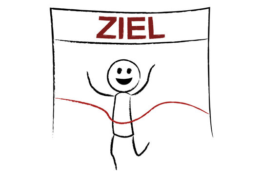 Mann l&auml;uft durch Ziellinie