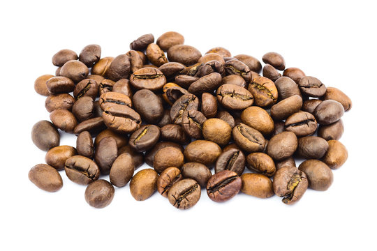 Pile of coffee beans isolated on white background.