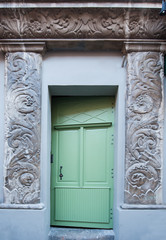 old wooden house Door in city