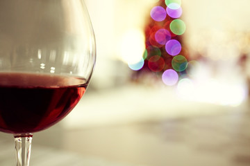 Glass of red wine on blurred background