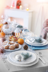 Table setting for Christmas dinner at home