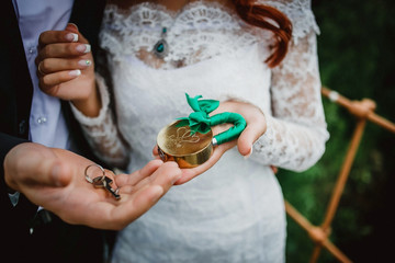 the lock in hands of newlyweds