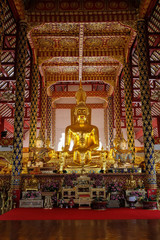 golden buddha statue in wat suan dok temple, chiang mai, thailan