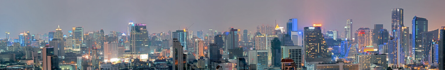 Fototapeta na wymiar Panoramic building modern business district of Bangkok at night.