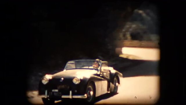 Footage of a TR2 Triumph roadster sports car