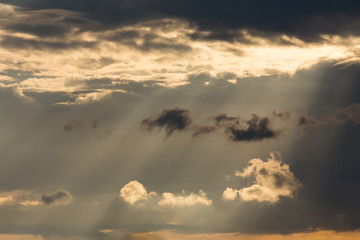 ray light of sun through cloud