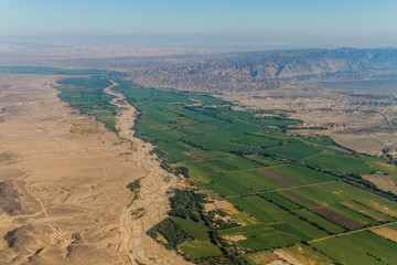 Aerial view of a lush green valley near Nazca, Peru