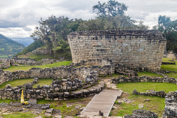 Fototapeta na wymiar Remnants of round houses in Kuelap, ruined citadel city of Chachapoyas cloud forest culture in mountains of northern Peru.