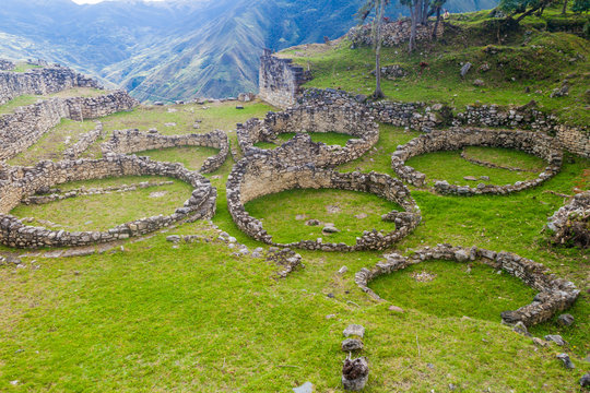 Remnants of round houses in Kuelap, ruined citadel city of Chachapoyas cloud forest culture in mountains of northern Peru.