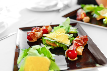 Healthy Food. Close Up Of Caesar Salad With Roast Chicken Fillet, Vegetables And Cheese On A Plate Served In Luxury Gourmet Restaurant. Meal, Diet Concept.