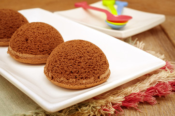 Chocolate chiffon dome cake on white plate, Selective focus