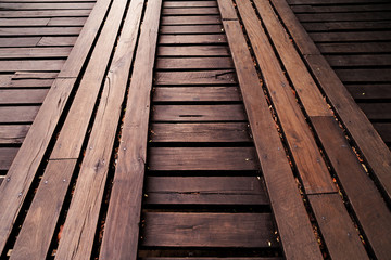 Fototapeta na wymiar light reflection on wooden bridge