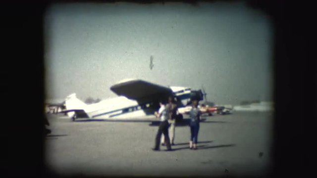 Vintage 8mm footage of plane taking off