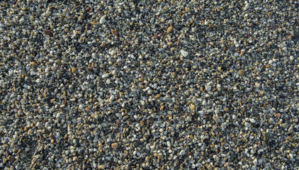 Small stones background from seaside