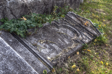 Old Tombstones overgrown grass