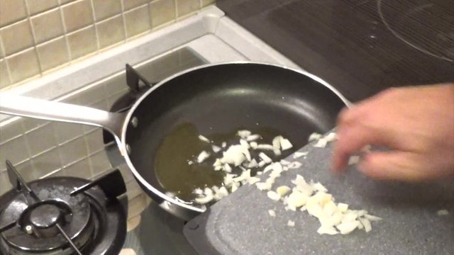 cooking onion for tomato sauce