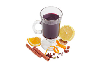 Cup of mulled wine and mulling spices on light background