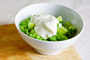 Cooking cucumber salad with greek yogurt dressing