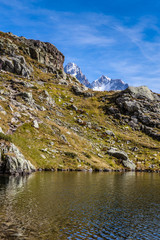 Fototapeta na wymiar Lac des Cheserys And And Two Peaks - France