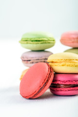 French Macaroons On White Boards Background